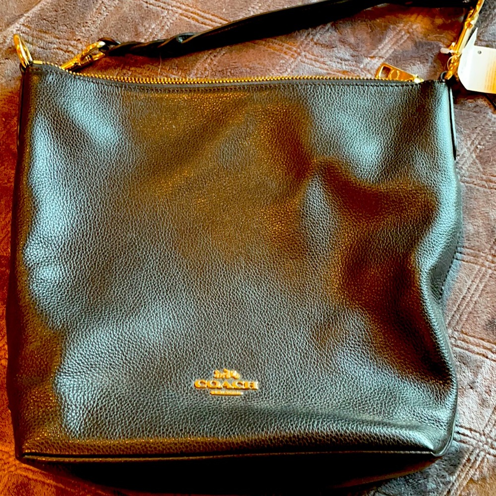 Beautiful NWT Coach Abby leather bag.